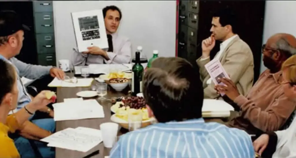 The community advisory board of the Pitt Men's Study sitting around a table, back in the 1980's